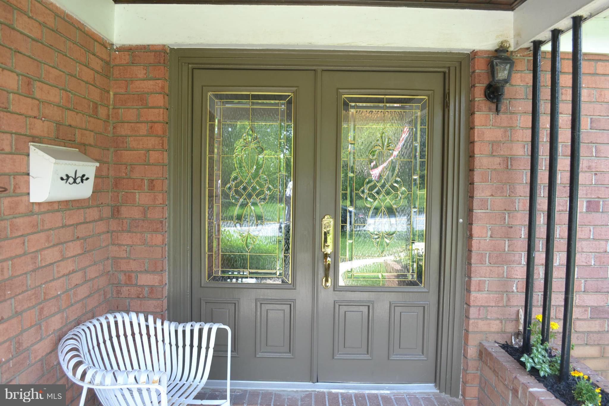 6602 Pimlico Road Baltimore, MD 21209 - Photo 4 of 23 a view of a porch with a door
