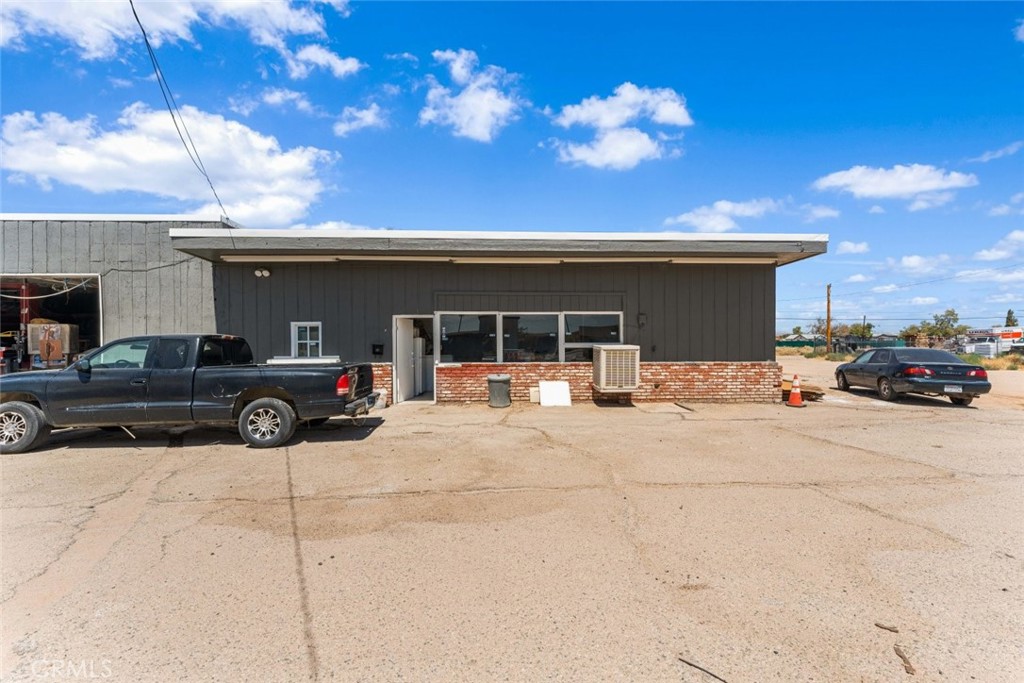 27157 Twenty Mule Team Road Boron, CA 93516 - Photo 3 of 32 a view of a cars park in front of house