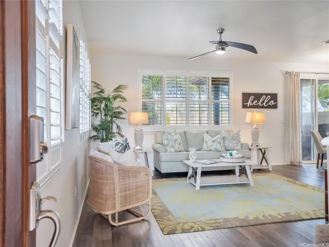 a living room with furniture and window