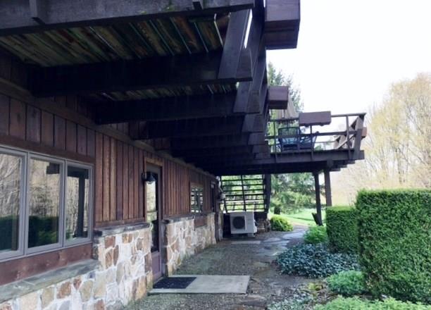 Outstanding cedar and stone rear view