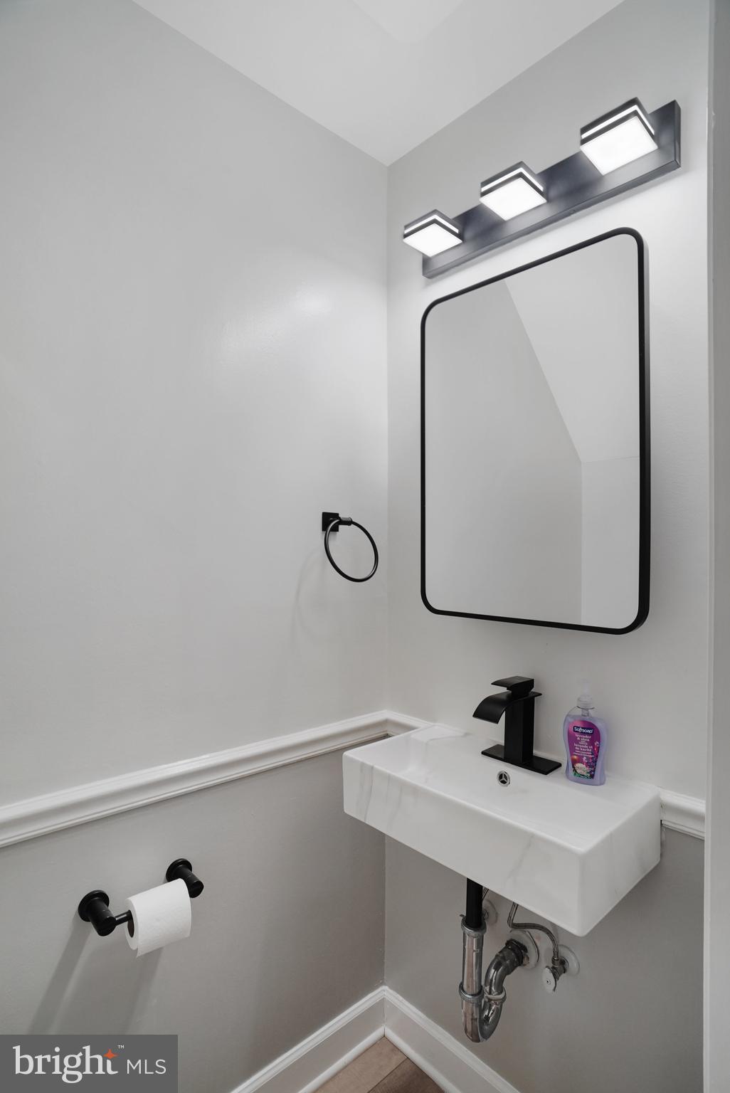 5925 Minutemen Road, Unit 248 Springfield, VA 22152 - Photo 10 of 26 Updated main level half bath