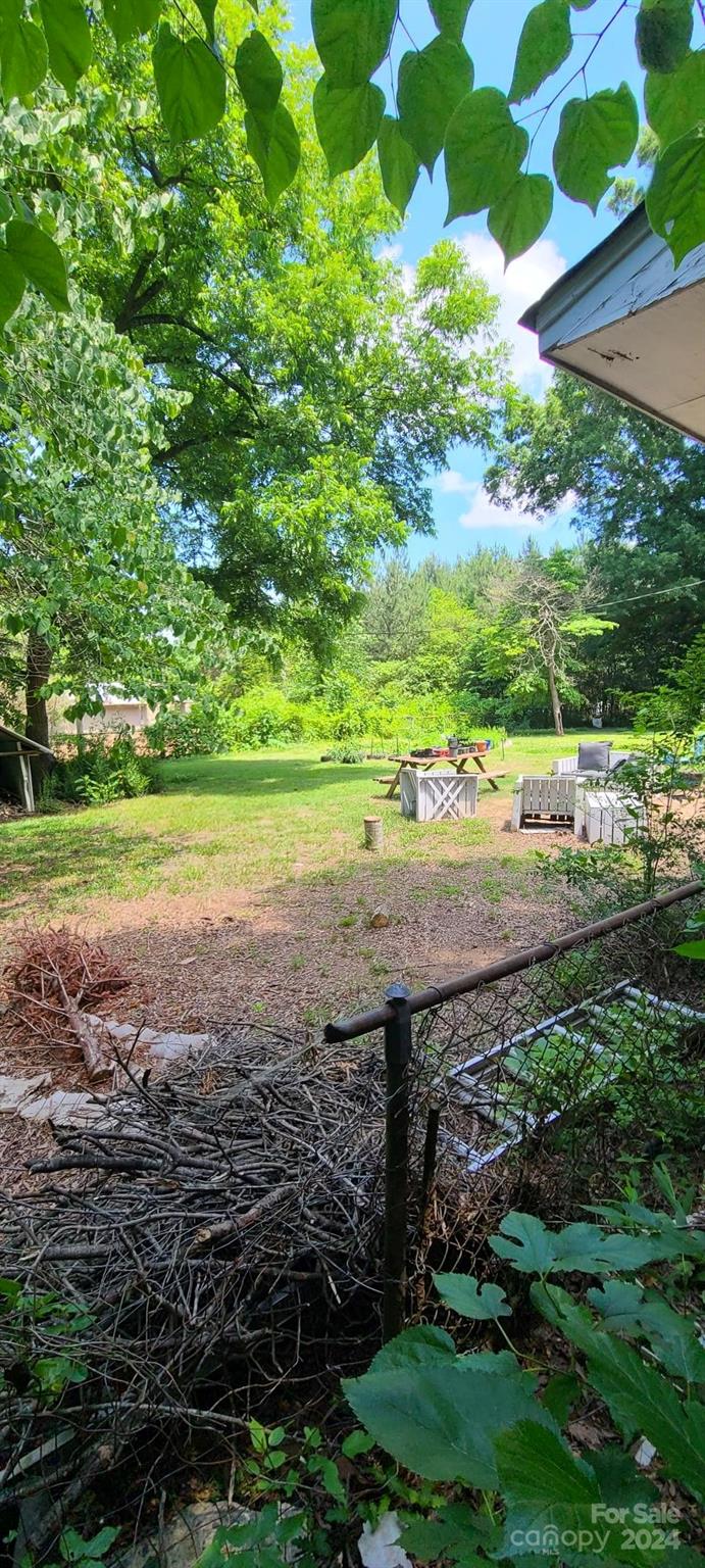 2210 Goldmine Road Monroe, NC 28110 - Photo 14 of 14 a view of a yard with an outdoor space