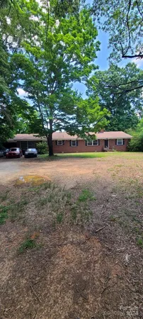 a view of a yard with a trees