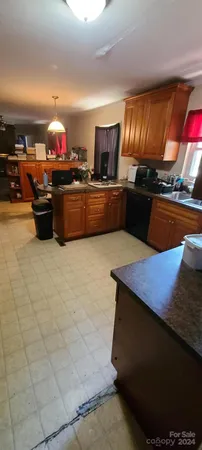 a bedroom with bed and window