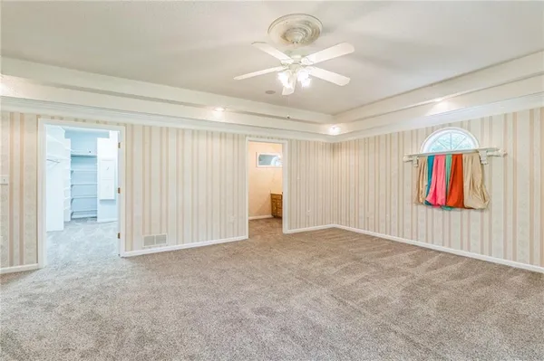 a view of work space with wooden floor and a window