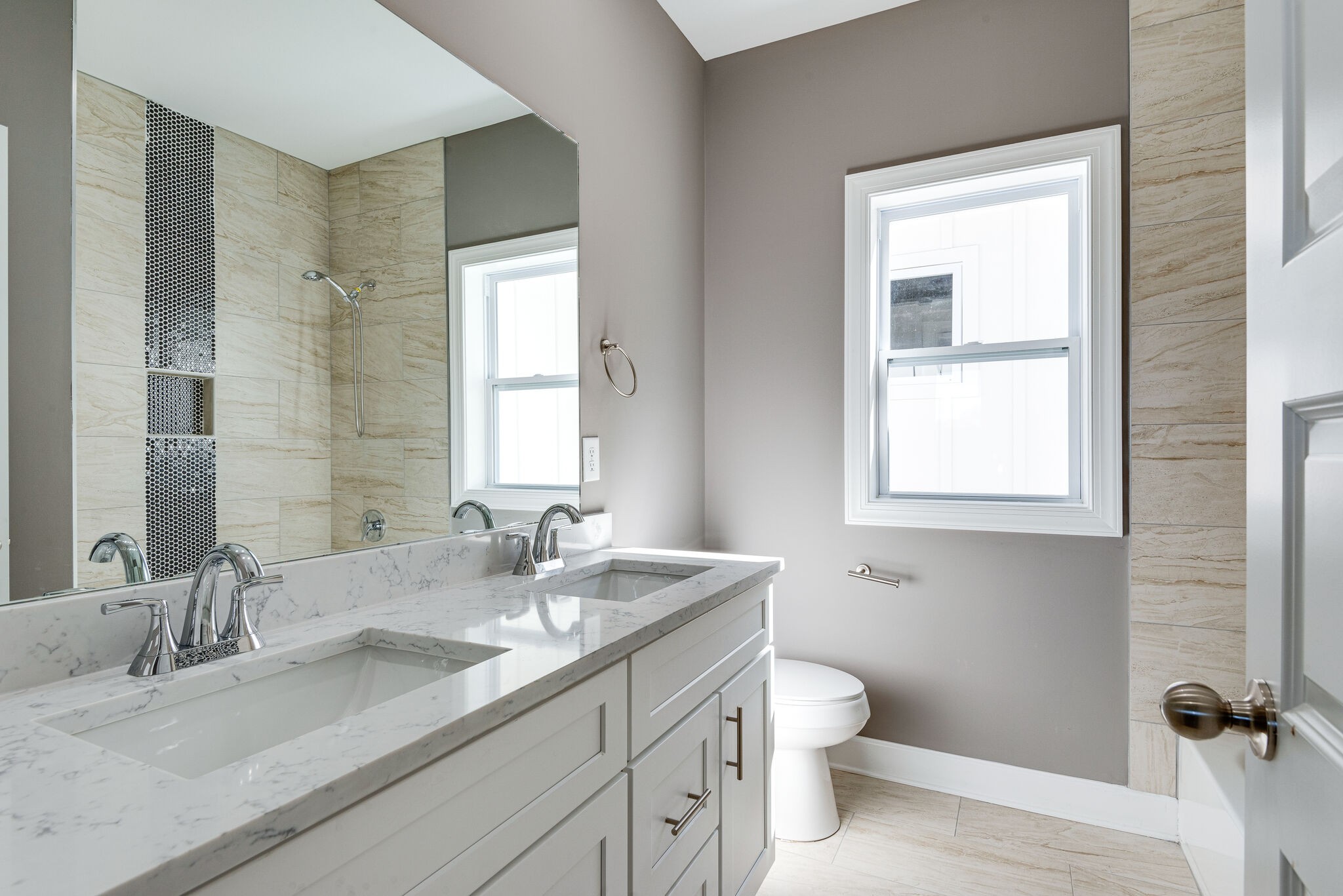 4341 Old Goins Road Nashville, TN 37211 - Photo 25 of 31 a bathroom with a granite countertop sink a toilet and a window
