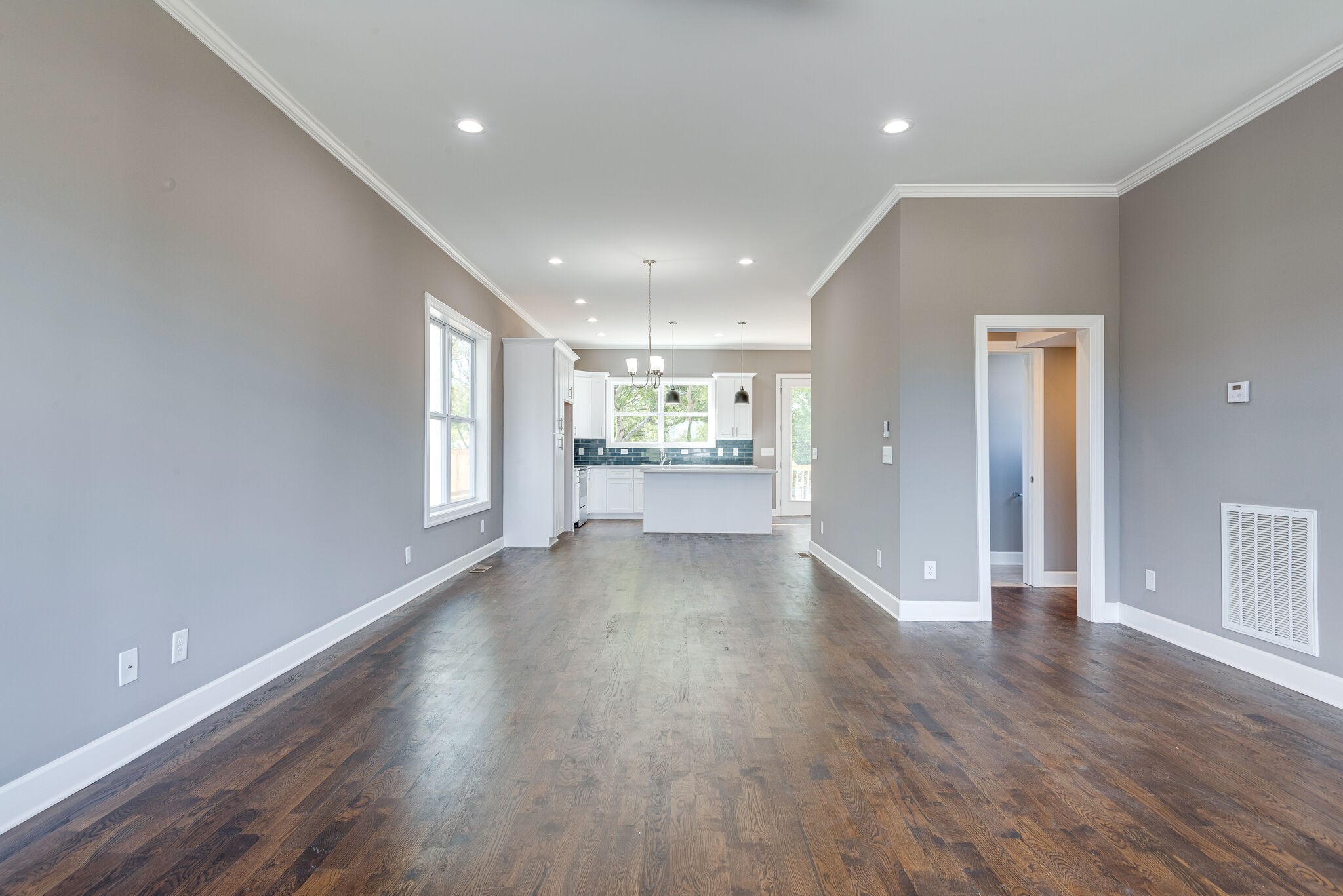 4341 Old Goins Road Nashville, TN 37211 - Photo 7 of 31 a view of an empty room with a window and wooden floor