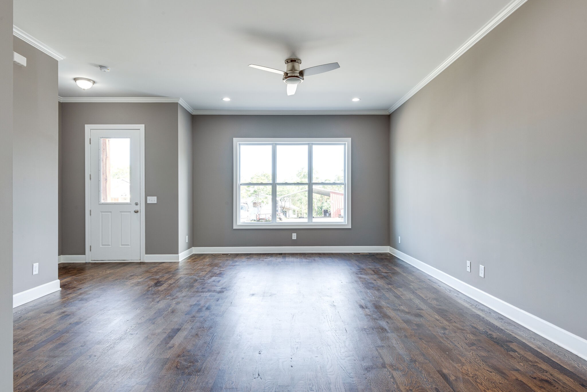 4341 Old Goins Road Nashville, TN 37211 - Photo 8 of 31 an empty room with wooden floor and windows