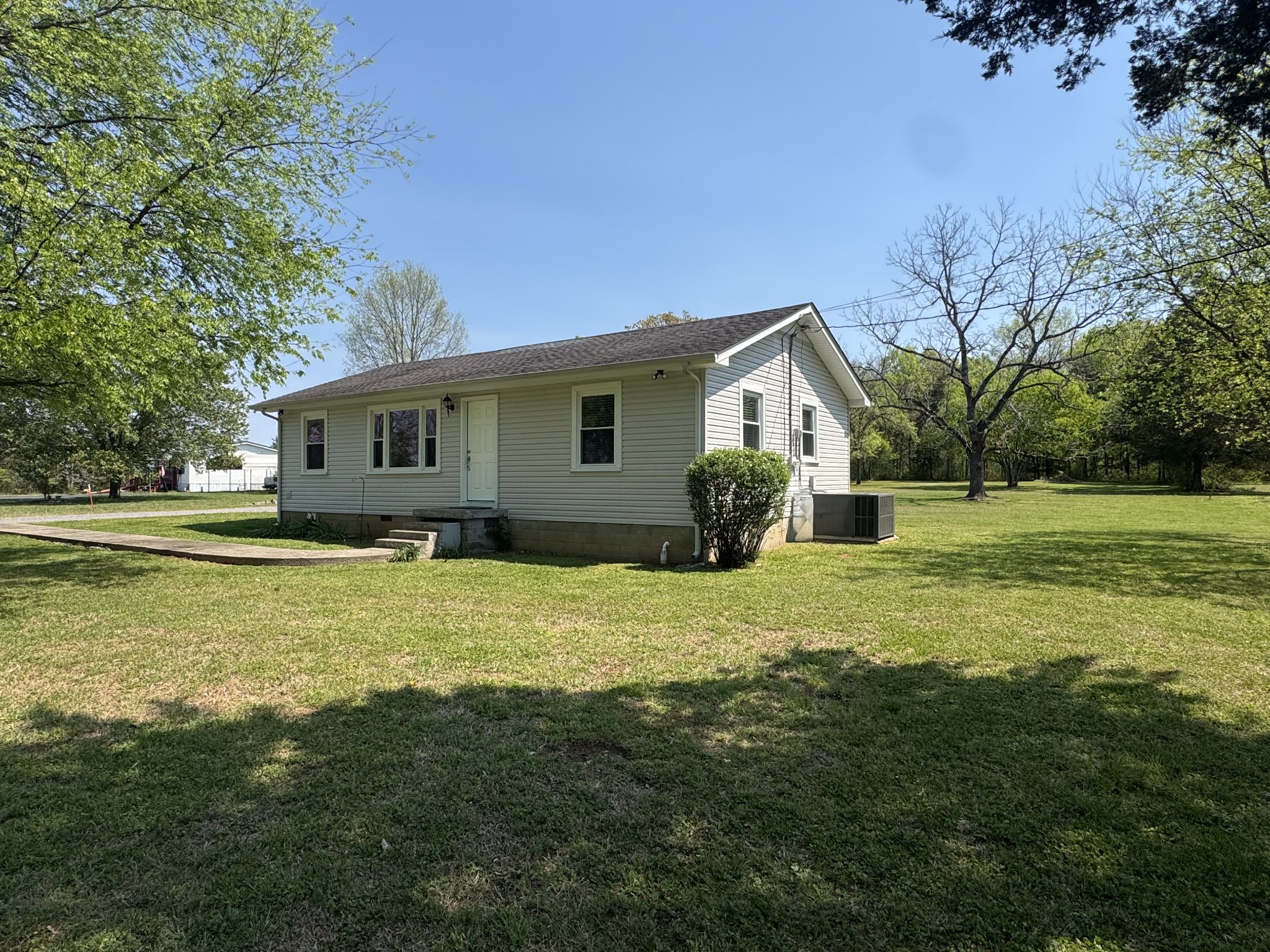 754 Cranor Road Murfreesboro, TN 37130 - Photo 3 of 21 a view of a house with a backyard