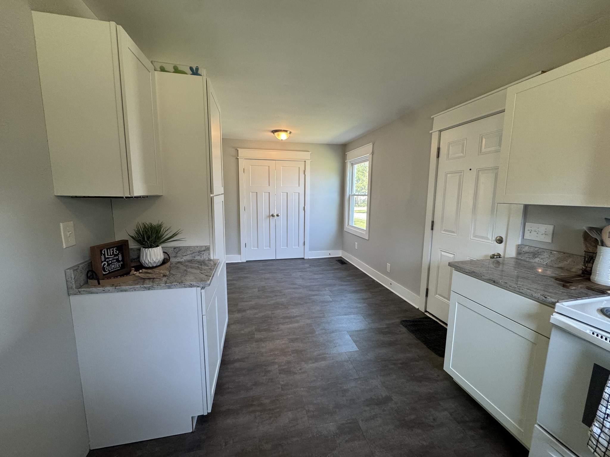 754 Cranor Road Murfreesboro, TN 37130 - Photo 7 of 21 a kitchen with stainless steel appliances a sink a stove a refrigerator and cabinets