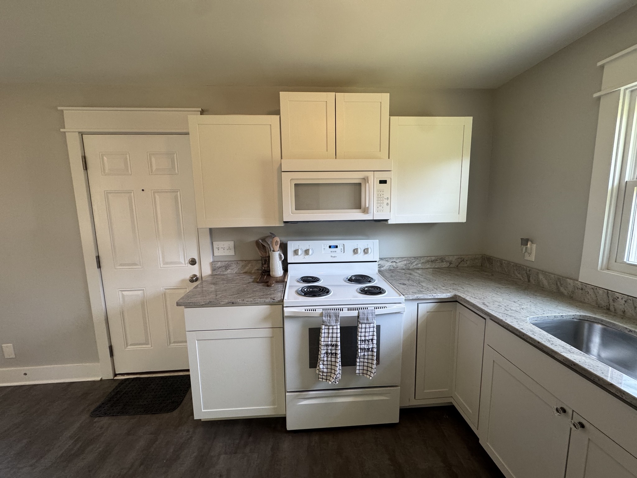 754 Cranor Road Murfreesboro, TN 37130 - Photo 8 of 21 a kitchen with stainless steel appliances white cabinets and a stove