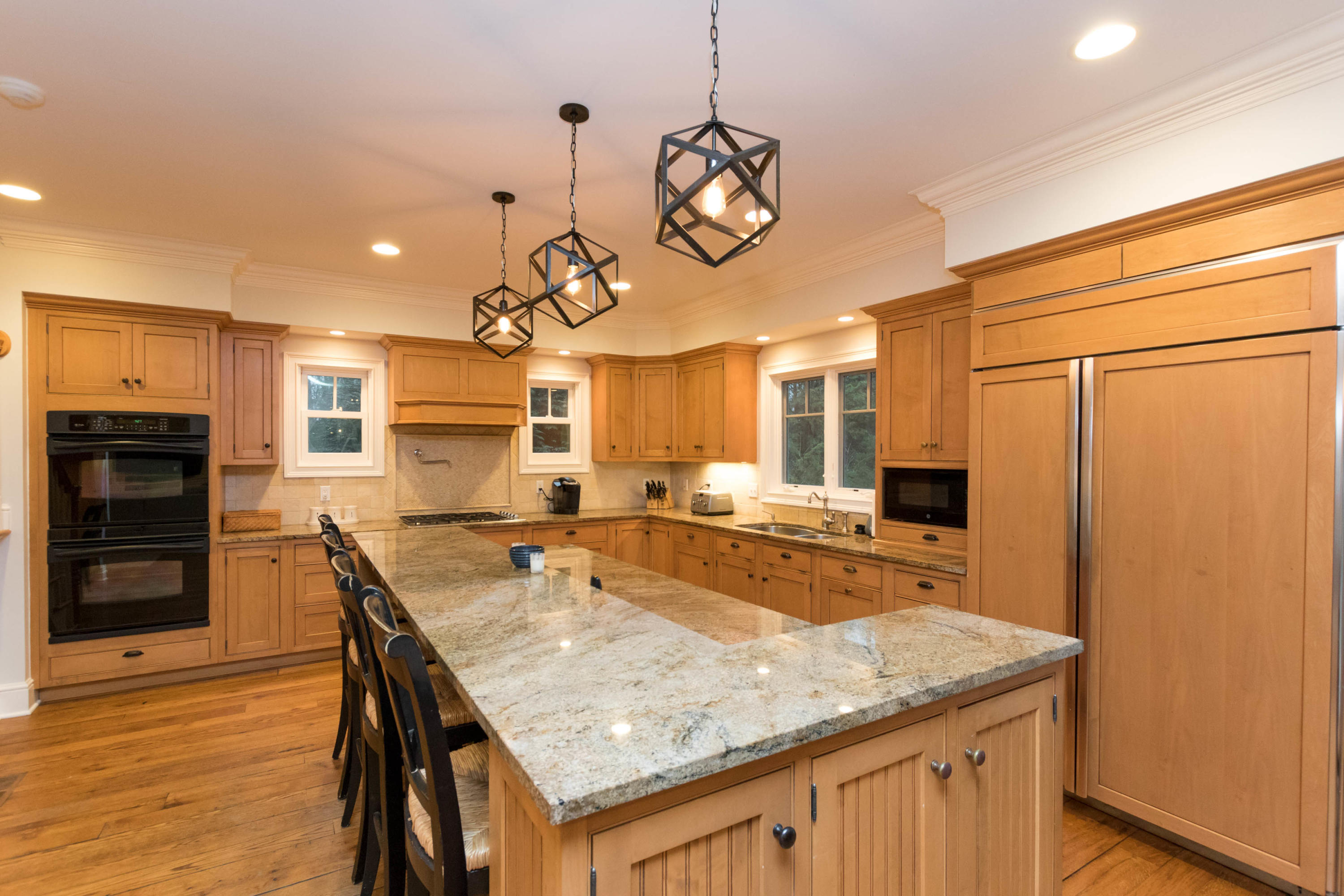 75 Colonial Road New Canaan, CT 06840 - Photo 14 of 49 a kitchen with a table and chairs in it