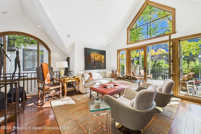 a very nice looking living room with a large window