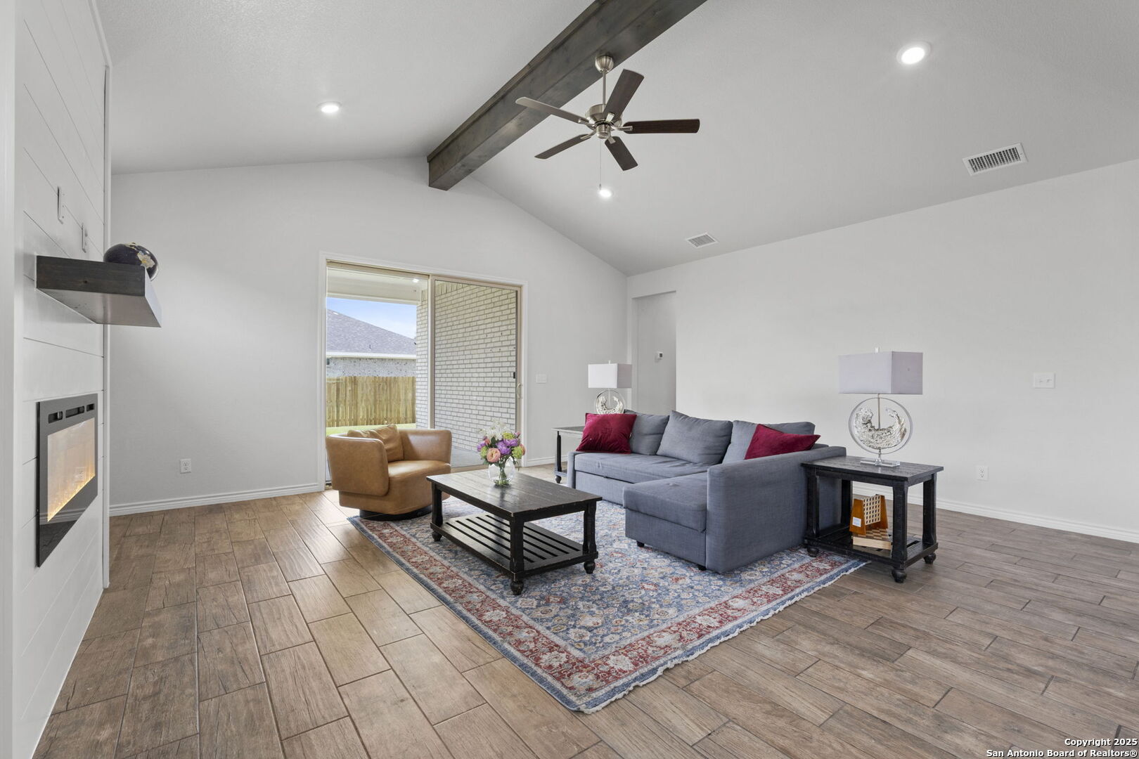 6110 Salerno Street Temple, TX 76502 - Photo 19 of 44 a living room with furniture and a wooden floor