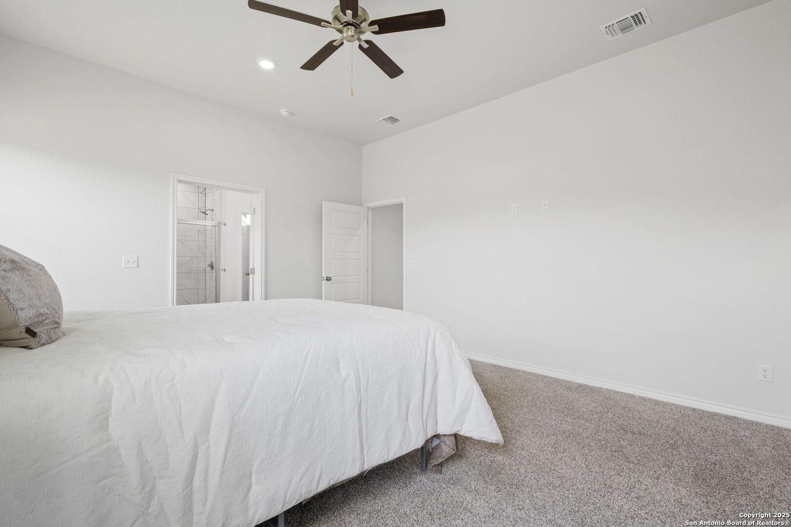 6110 Salerno Street Temple, TX 76502 - Photo 25 of 44 a bed room with a bed and a ceiling fan