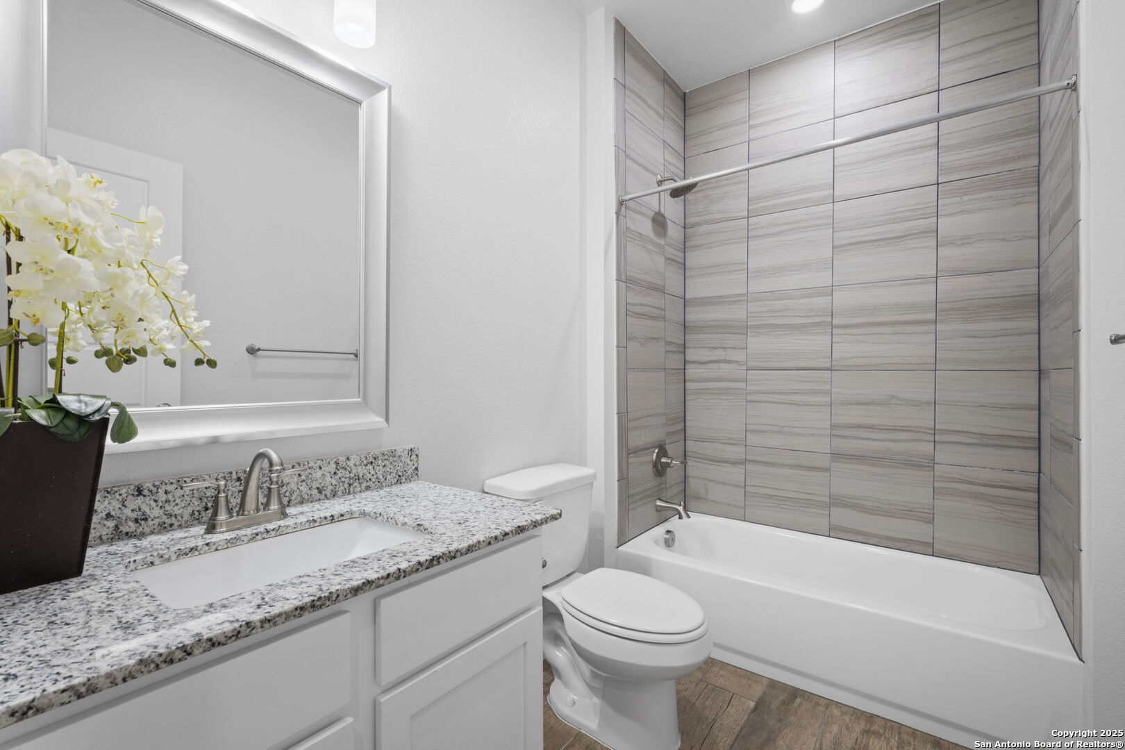 6110 Salerno Street Temple, TX 76502 - Photo 30 of 44 a bathroom with a granite countertop sink toilet and shower