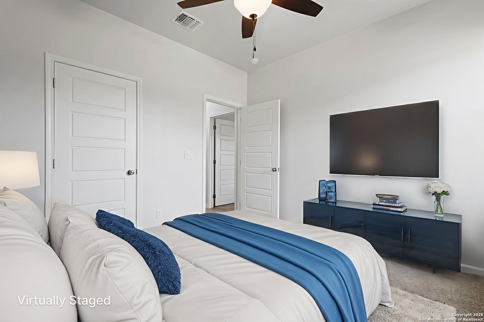 6110 Salerno Street Temple, TX 76502 - Photo 38 of 44 a bedroom with a bed and a flat screen tv