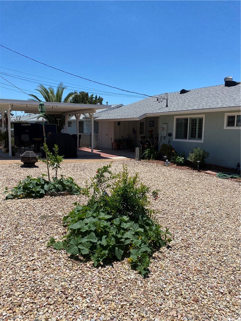 28950 Pebble Beach Drive Menifee, CA 92586 - Photo 18 of 18 a front view of a house with a yard
