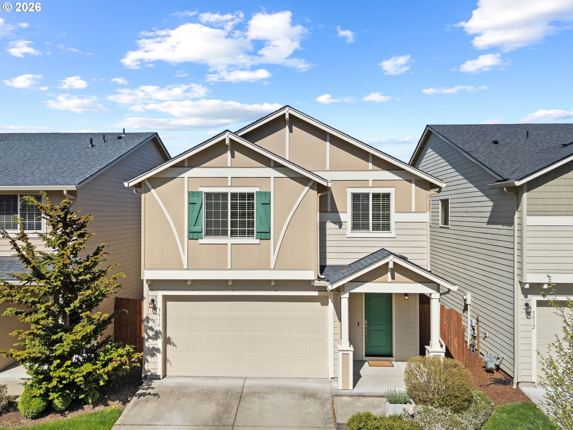 3010 Northeast 74th Street Vancouver, WA 98665 - Photo 1 of 39 a view of a house with a yard and potted plants