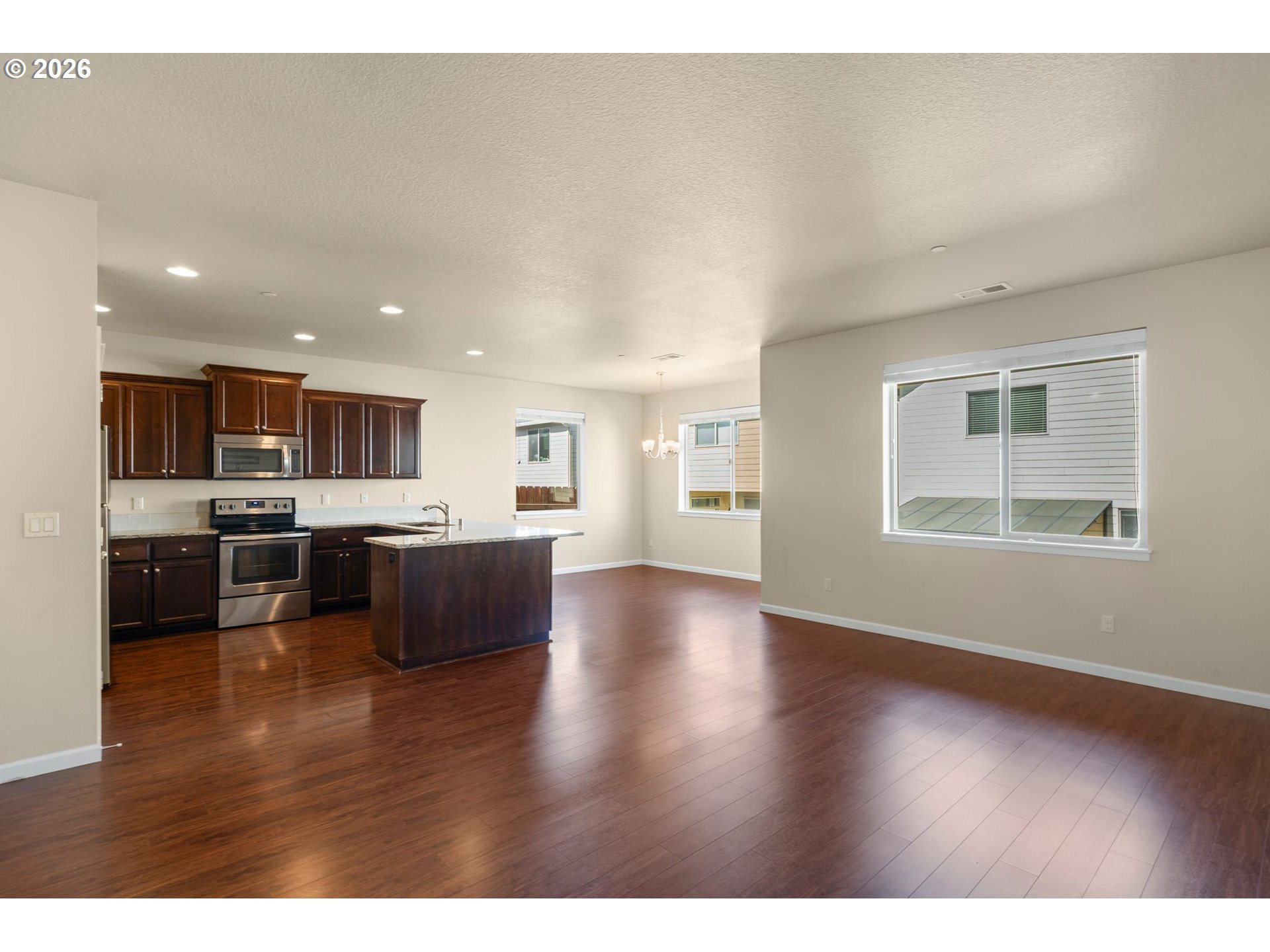 3010 Northeast 74th Street Vancouver, WA 98665 - Photo 12 of 39 a view of kitchen with furniture and wooden floor