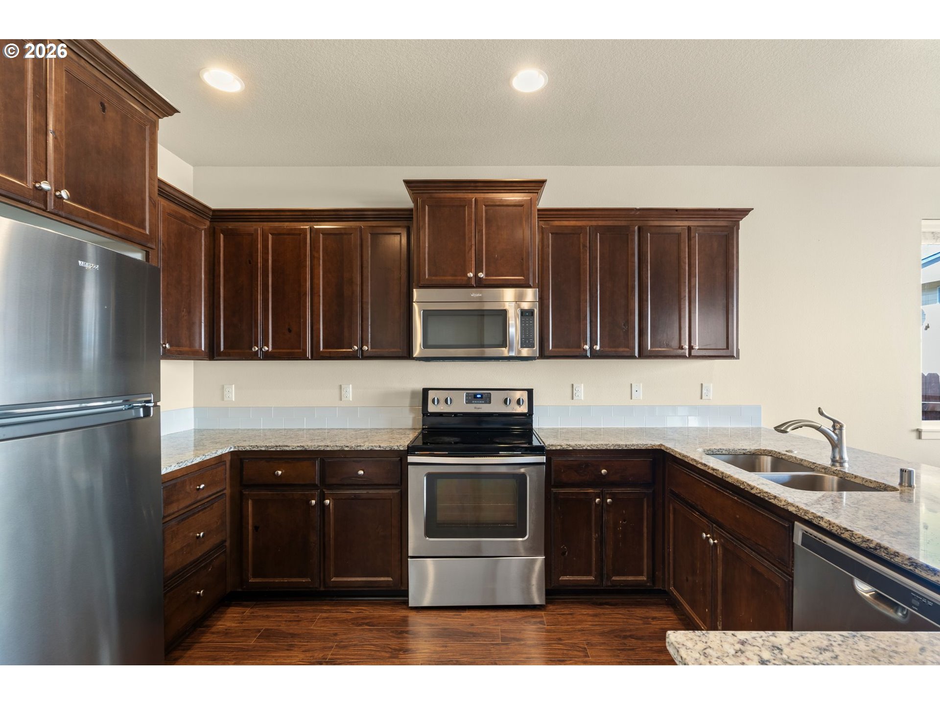 3010 Northeast 74th Street Vancouver, WA 98665 - Photo 13 of 39 a kitchen with a sink and stainless steel appliances