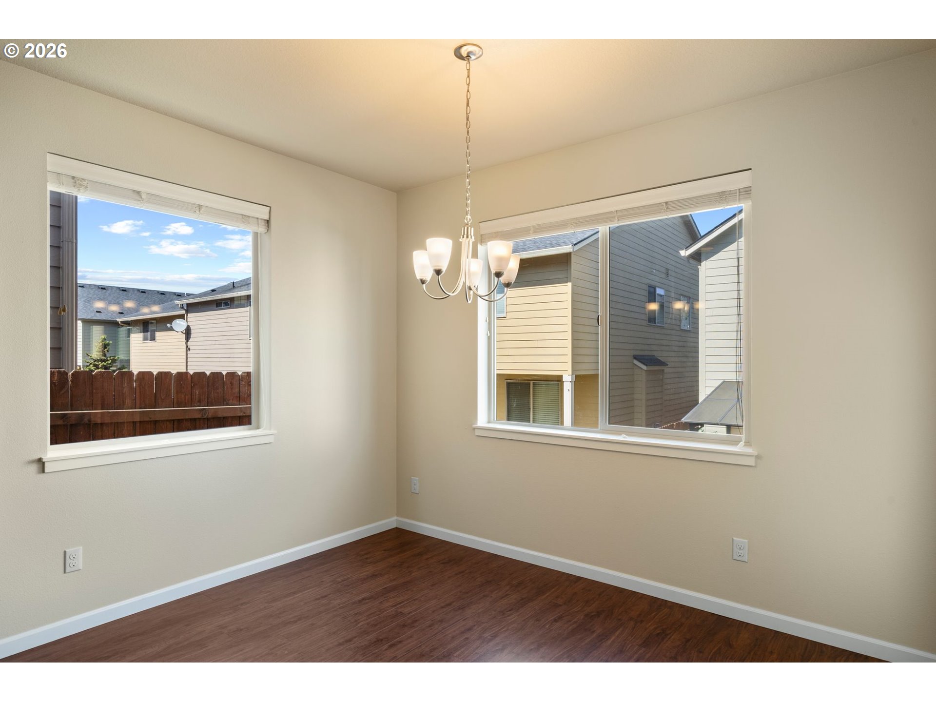 3010 Northeast 74th Street Vancouver, WA 98665 - Photo 17 of 39 an empty room with wooden floor and windows
