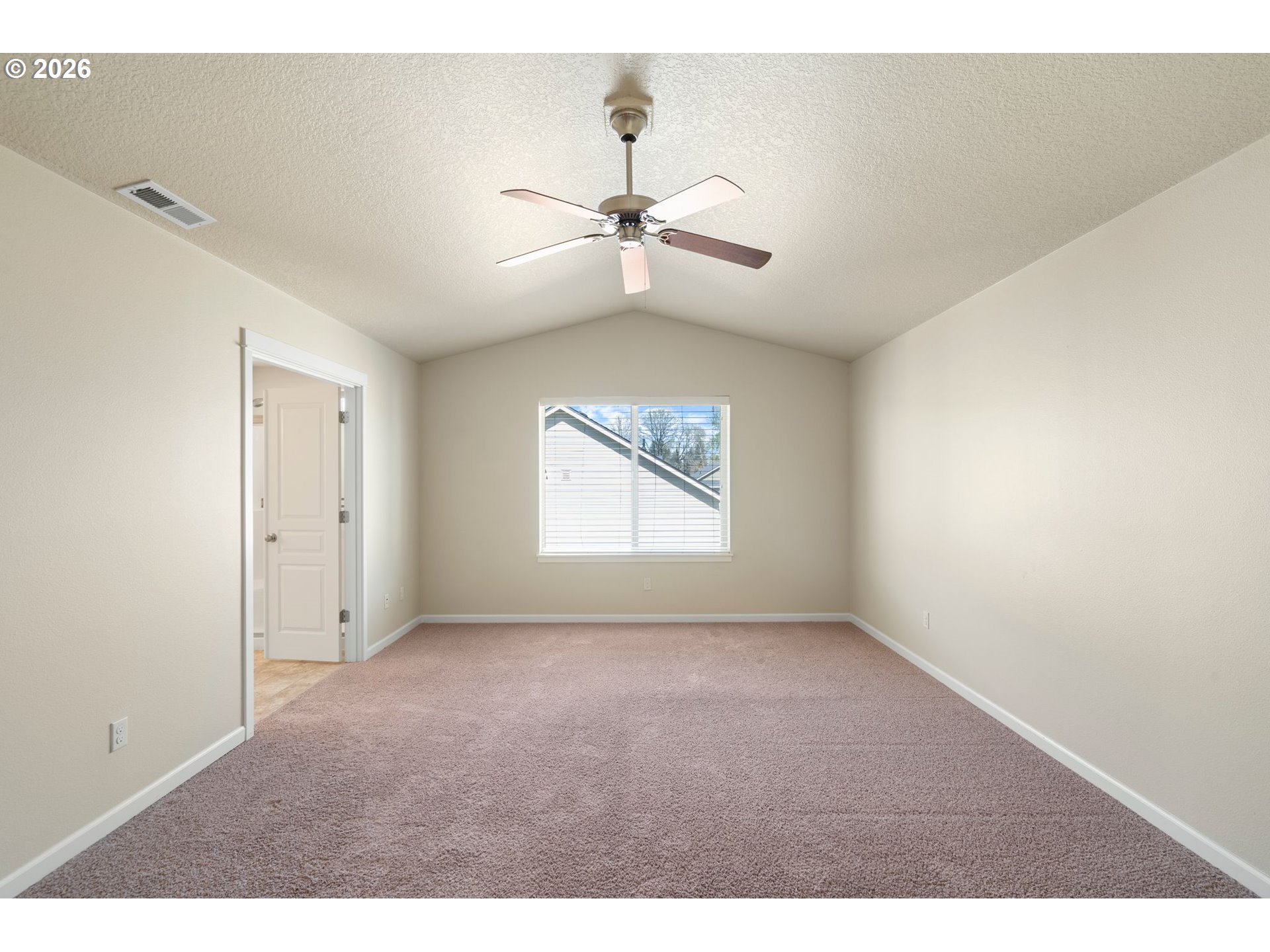3010 Northeast 74th Street Vancouver, WA 98665 - Photo 18 of 39 an empty room with windows and fan