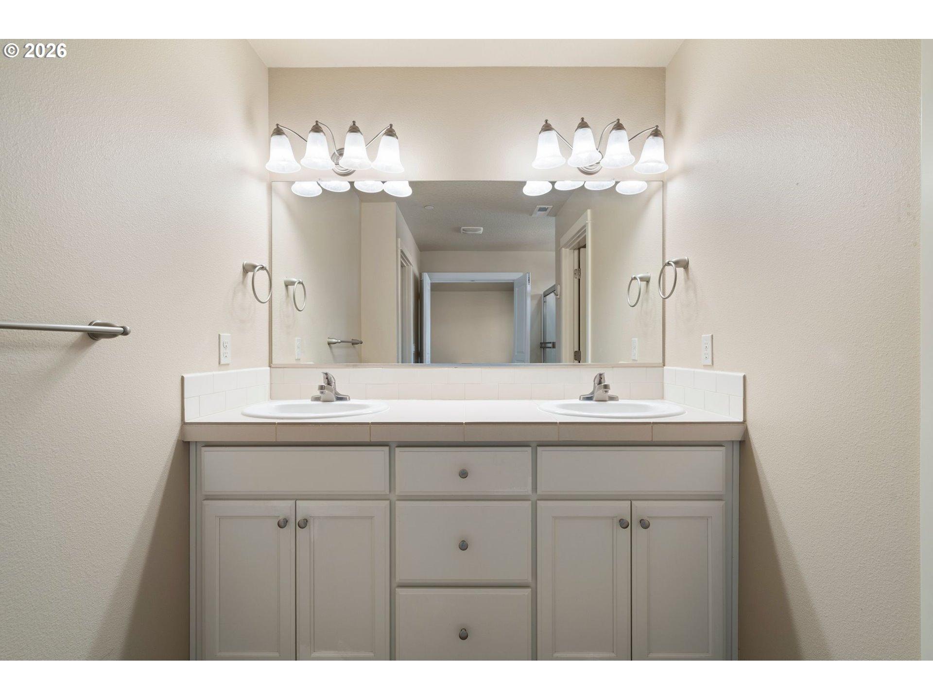 3010 Northeast 74th Street Vancouver, WA 98665 - Photo 19 of 39 a bathroom with a sink double vanity and a mirror
