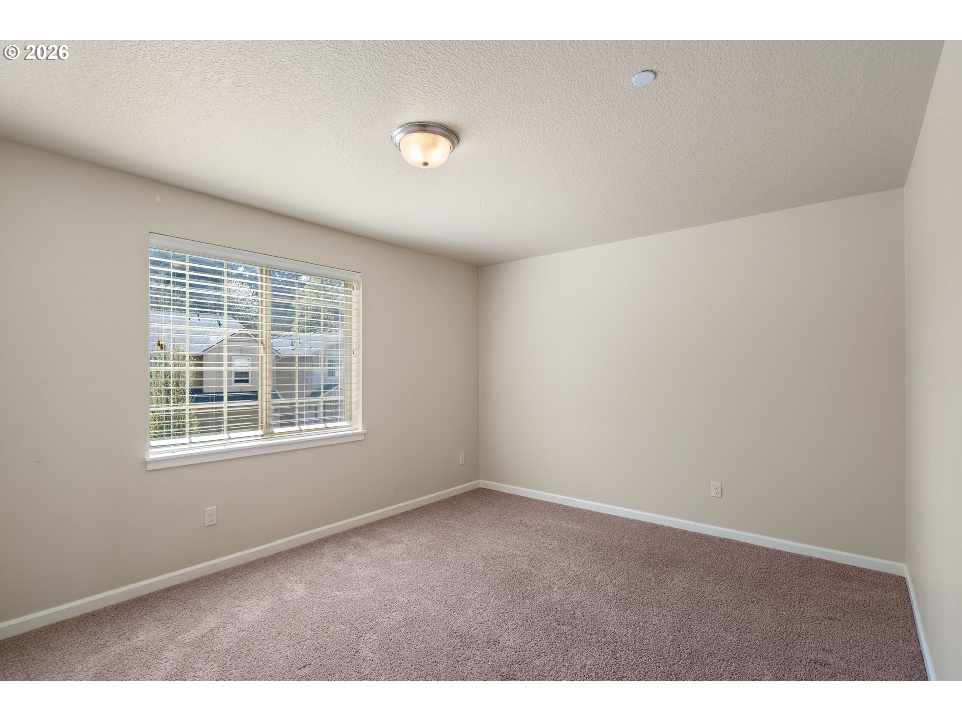 3010 Northeast 74th Street Vancouver, WA 98665 - Photo 25 of 39 a view of an empty room with a window