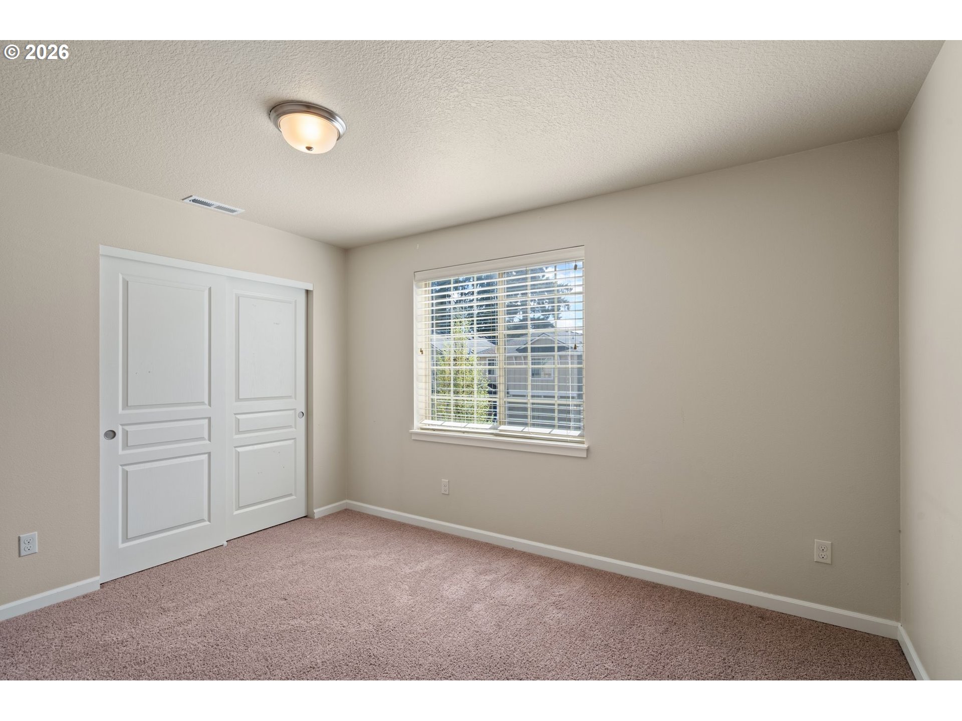 3010 Northeast 74th Street Vancouver, WA 98665 - Photo 26 of 39 a view of an empty room with a window
