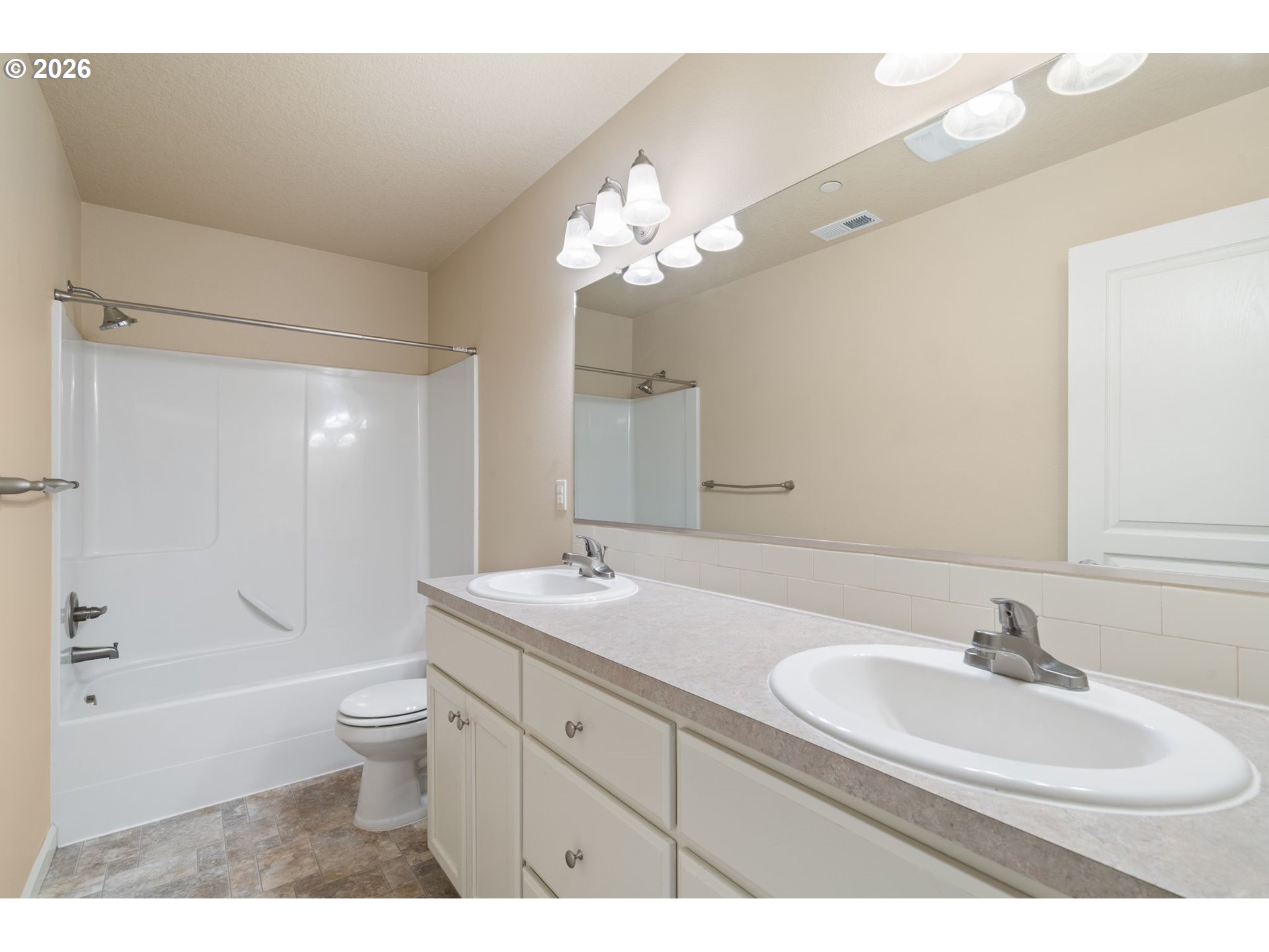 3010 Northeast 74th Street Vancouver, WA 98665 - Photo 28 of 39 a bathroom with a double vanity sink mirror and toilet