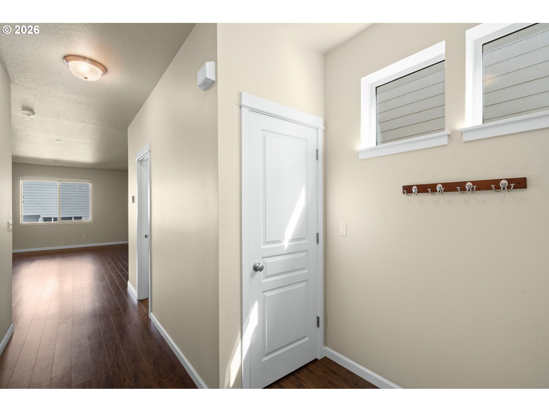 3010 Northeast 74th Street Vancouver, WA 98665 - Photo 8 of 39 a view of an empty room with wooden floor and a bathroom