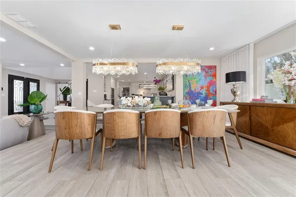 a kitchen with a sink and stainless steel appliances