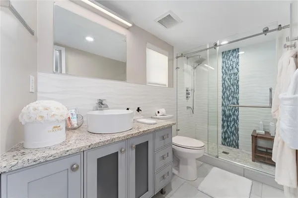 a view of a lake with houses