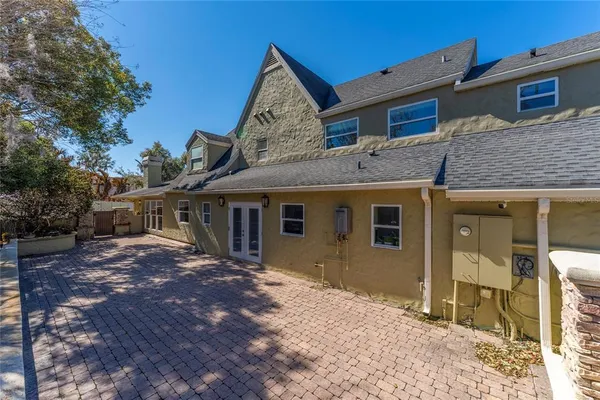 a view of swimming pool with sitting area