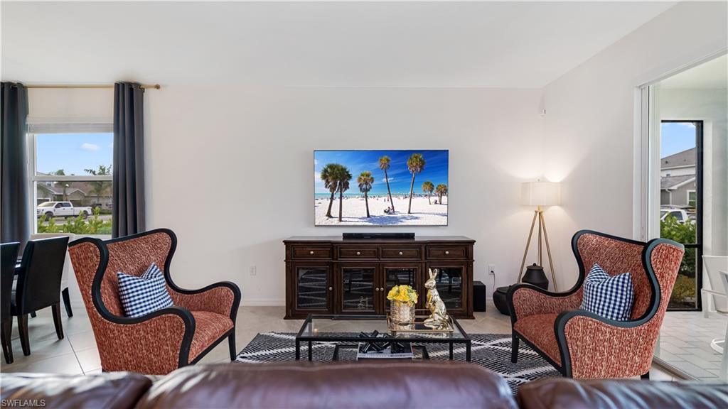 2425 Orchard Street Naples, FL 34120 - Photo 7 of 28 a living room with furniture and wooden floor