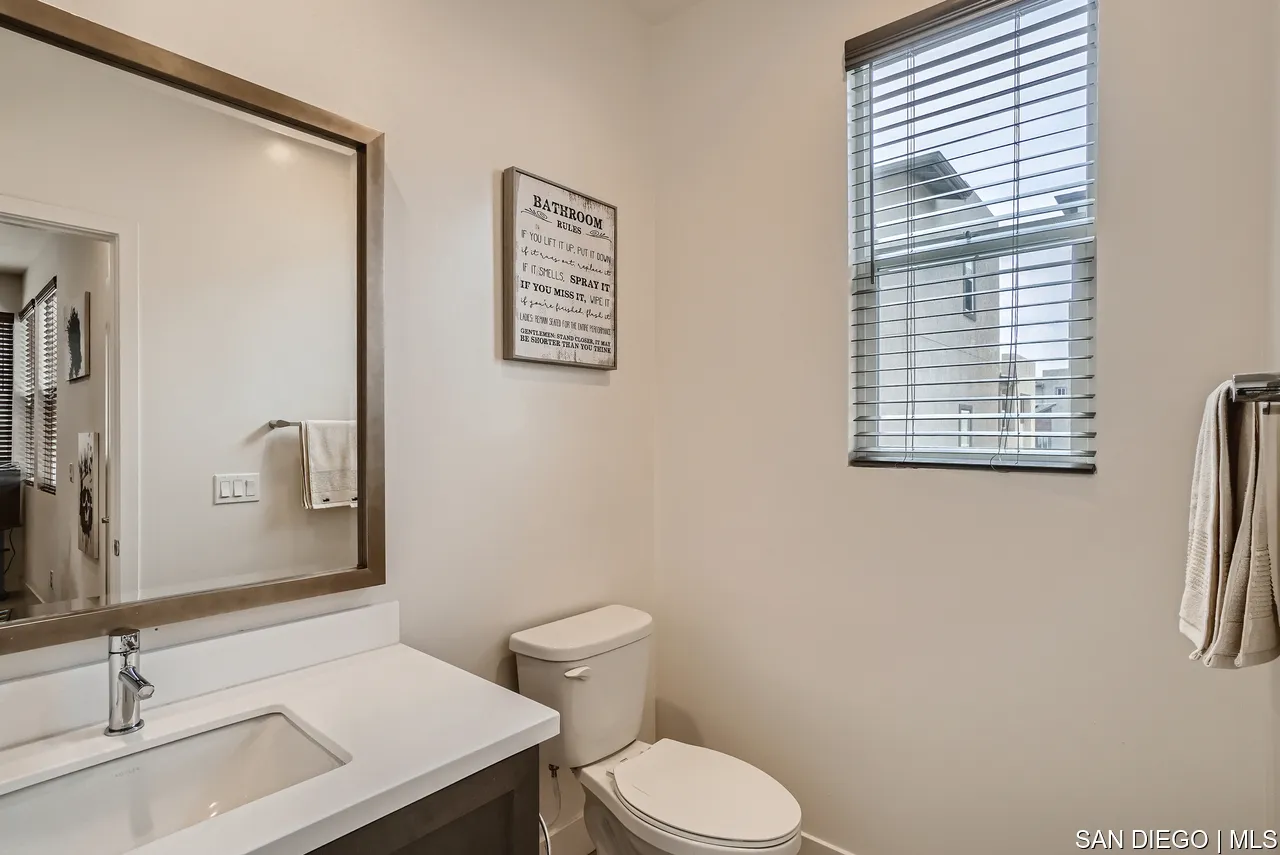 2110 Element Way Chula Vista, CA 91915 - Photo 17 of 33 a bathroom with a sink and a toilet