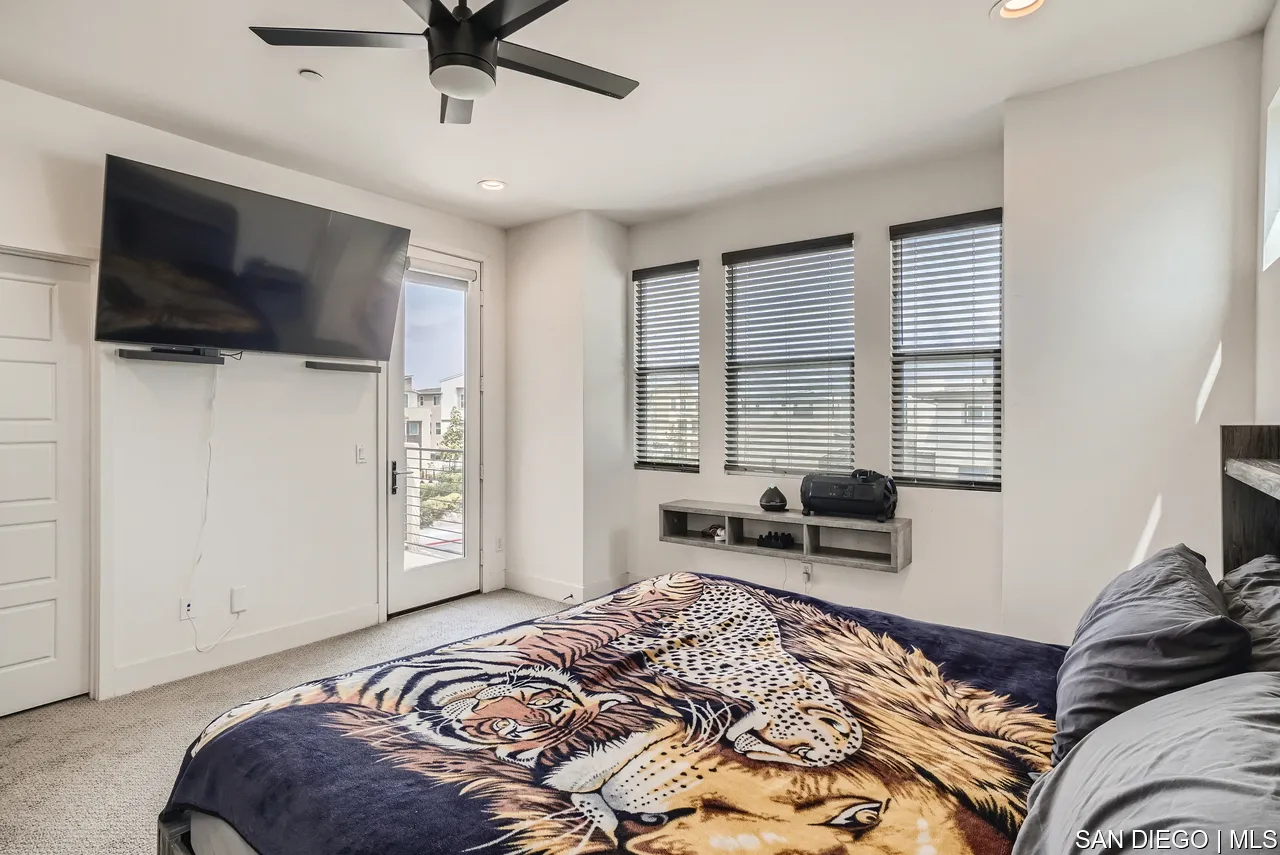 2110 Element Way Chula Vista, CA 91915 - Photo 21 of 33 a bedroom with a bed and a television