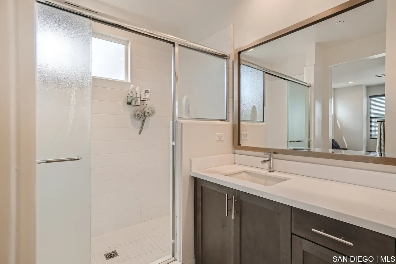 2110 Element Way Chula Vista, CA 91915 - Photo 23 of 33 a bathroom with a sink and a mirror