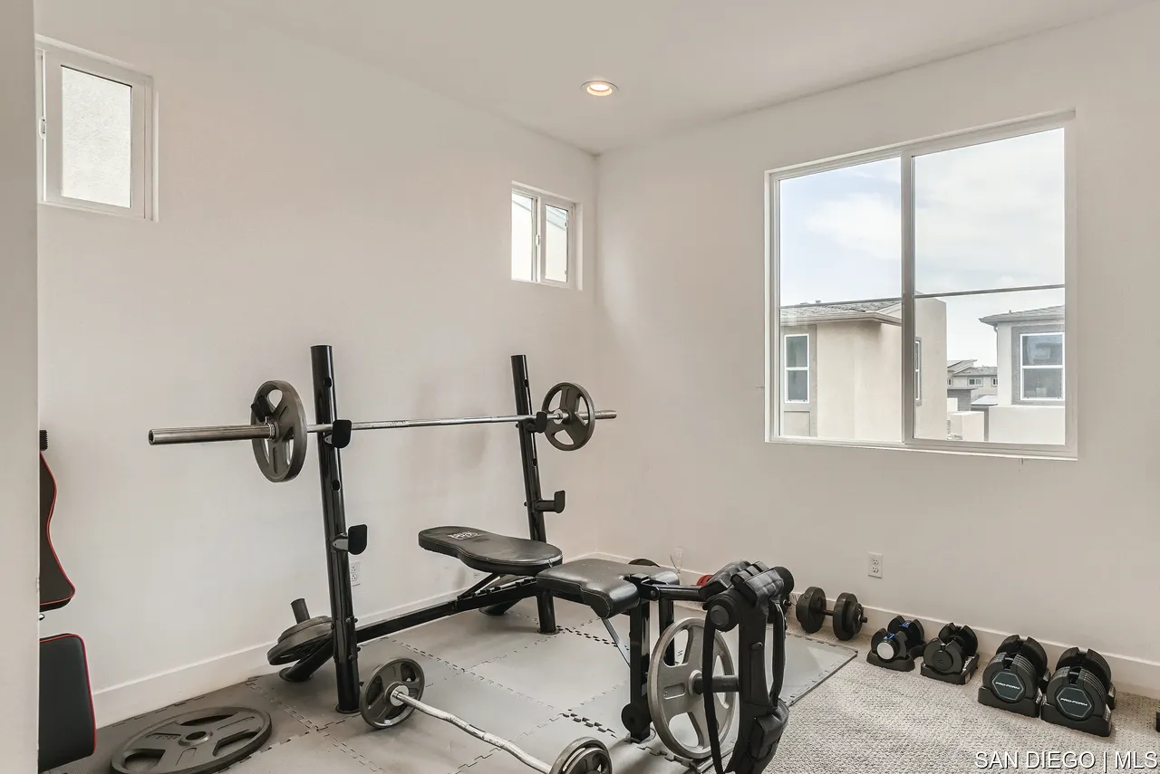 2110 Element Way Chula Vista, CA 91915 - Photo 25 of 33 a view of a workspace with furniture and a window