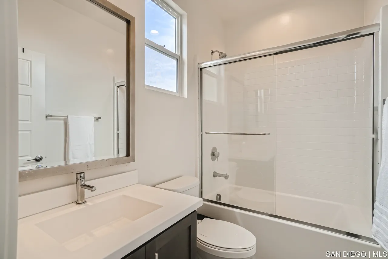 2110 Element Way Chula Vista, CA 91915 - Photo 26 of 33 a bathroom with a sink toilet and shower