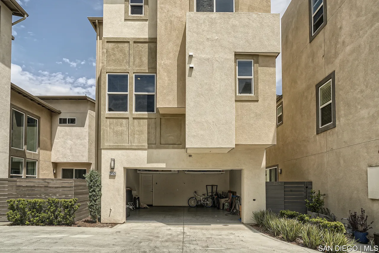 2110 Element Way Chula Vista, CA 91915 - Photo 28 of 33 a front view of a house with a garage