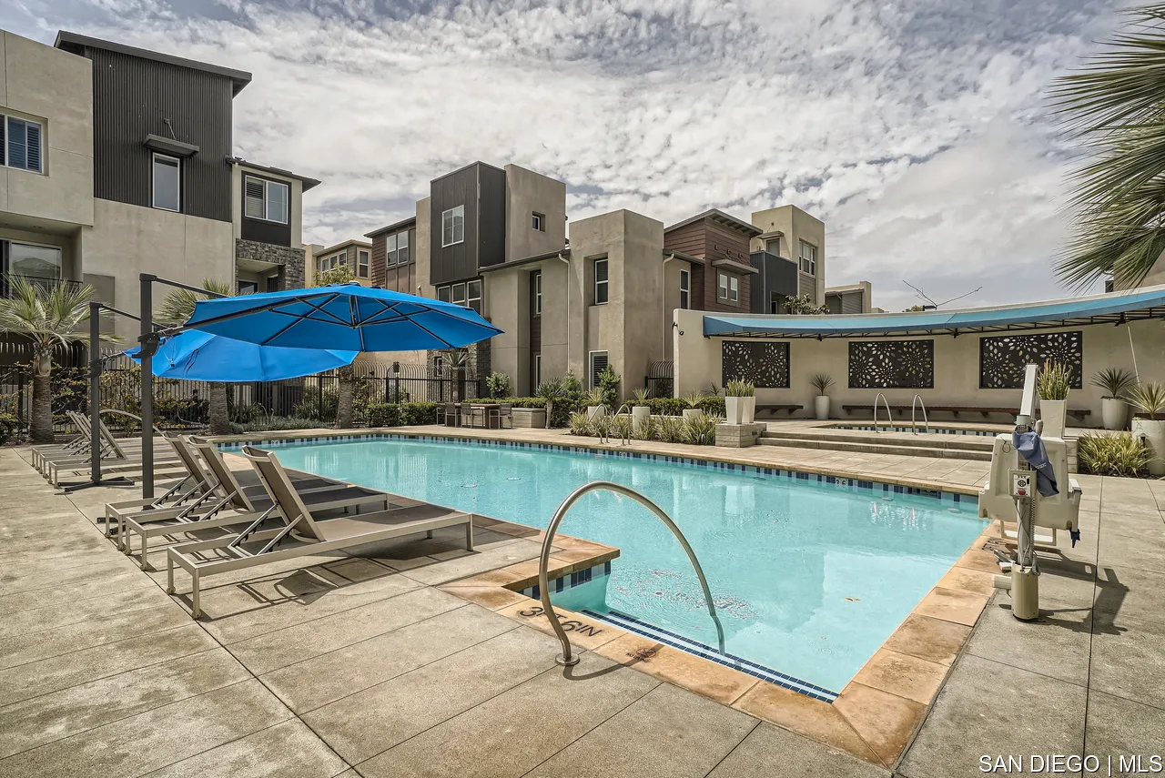 2110 Element Way Chula Vista, CA 91915 - Photo 29 of 33 a view of a swimming pool with a lounge chairs