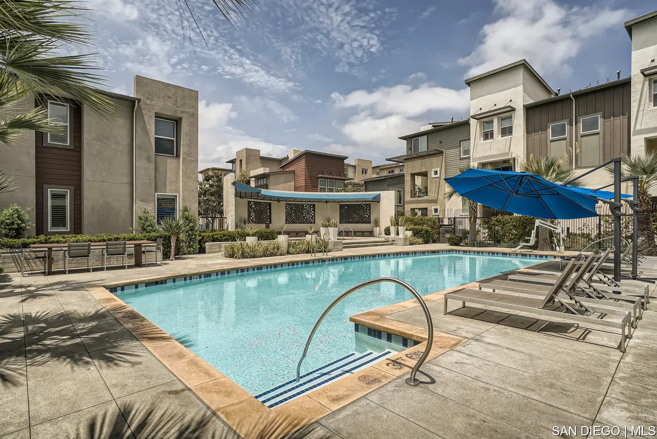 2110 Element Way Chula Vista, CA 91915 - Photo 30 of 33 a view of a swimming pool with a lounge chairs