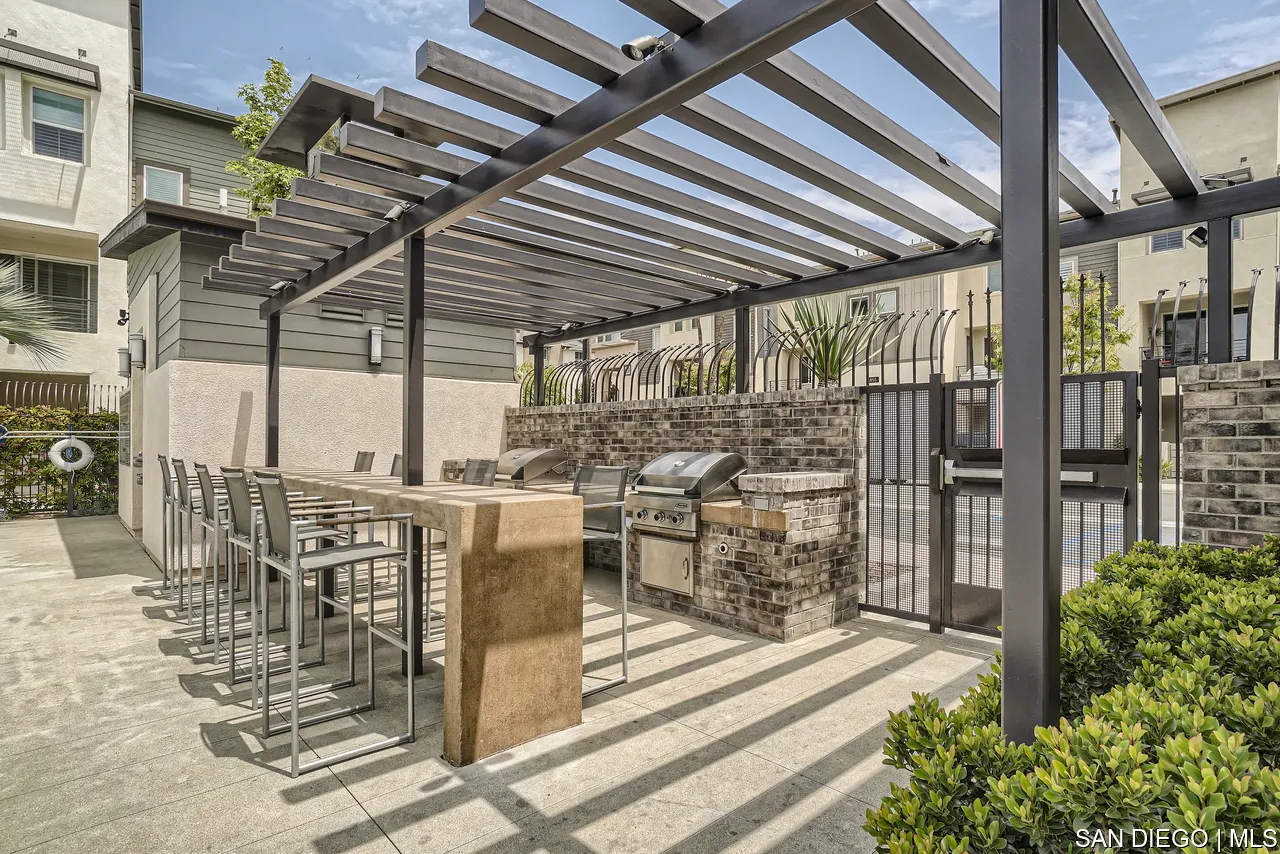 2110 Element Way Chula Vista, CA 91915 - Photo 31 of 33 a view of a patio with table and chairs and potted plants