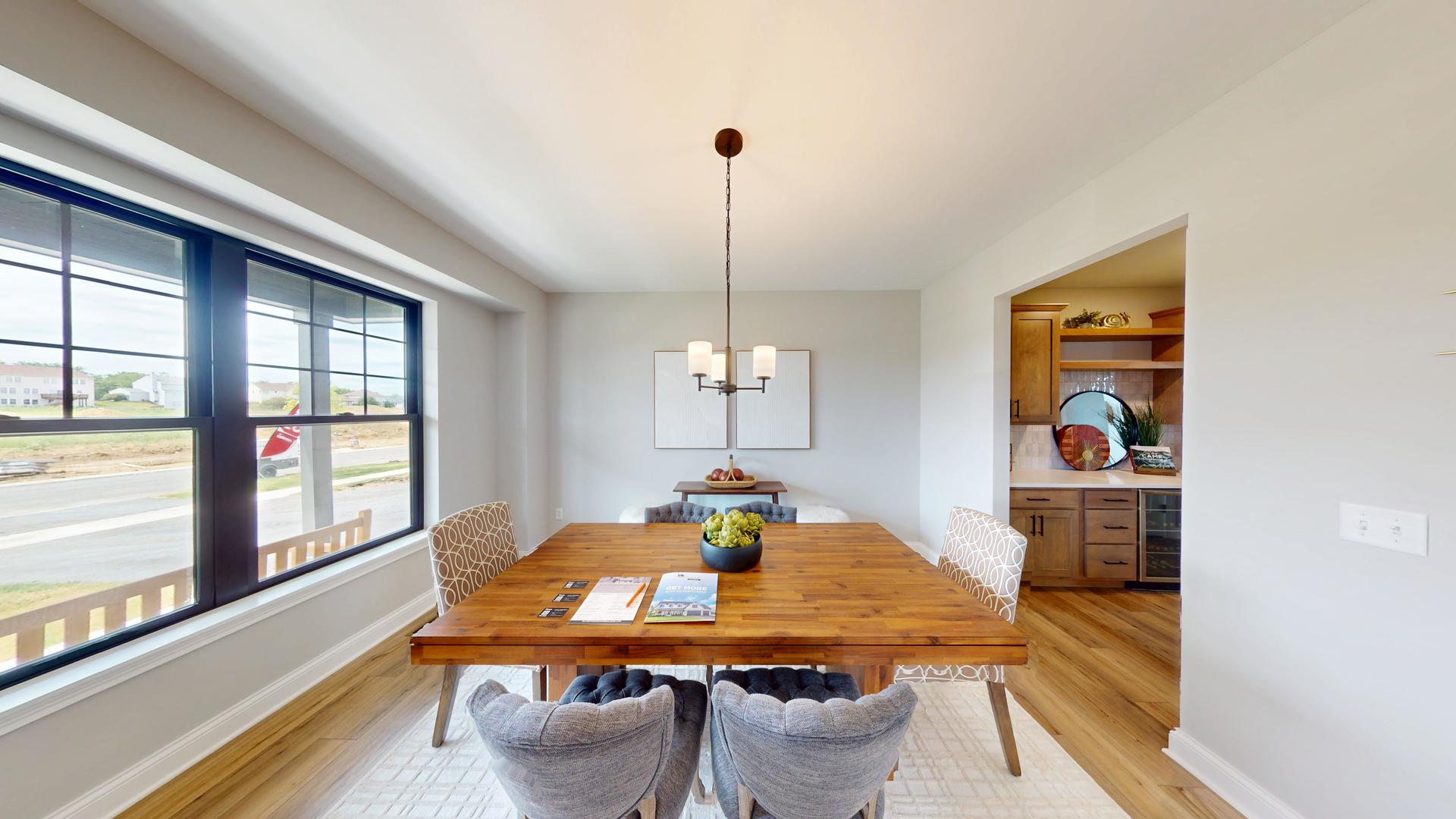 3S701 Deerpath Road North Aurora, IL 60542 - Photo 6 of 41 a view of a dining room with furniture window and outside view