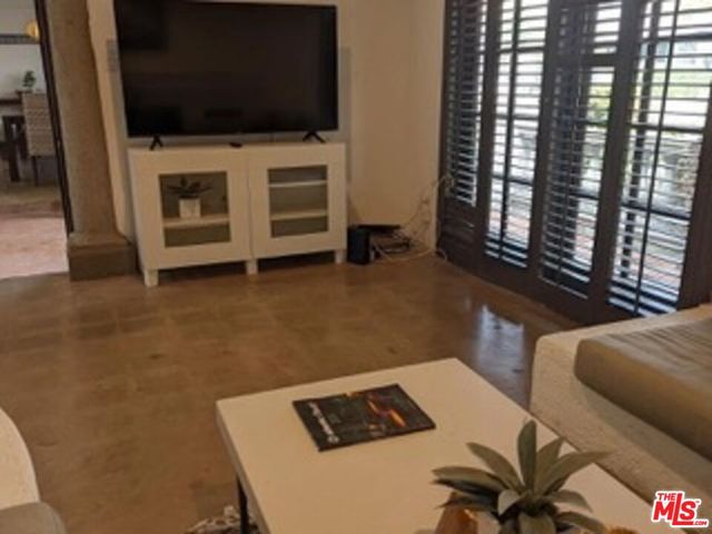 a room with a table and chairs