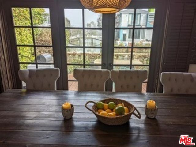 a kitchen with a sink and a refrigerator