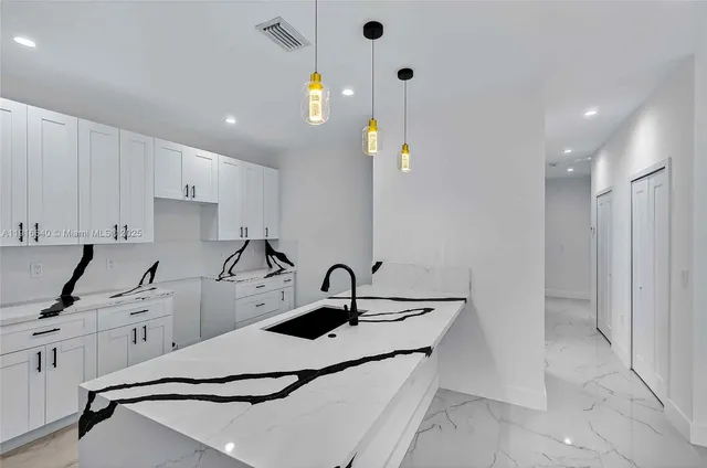 a view of a livingroom with an empty space and window