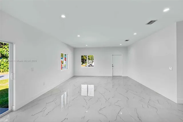 a view of a room with a window